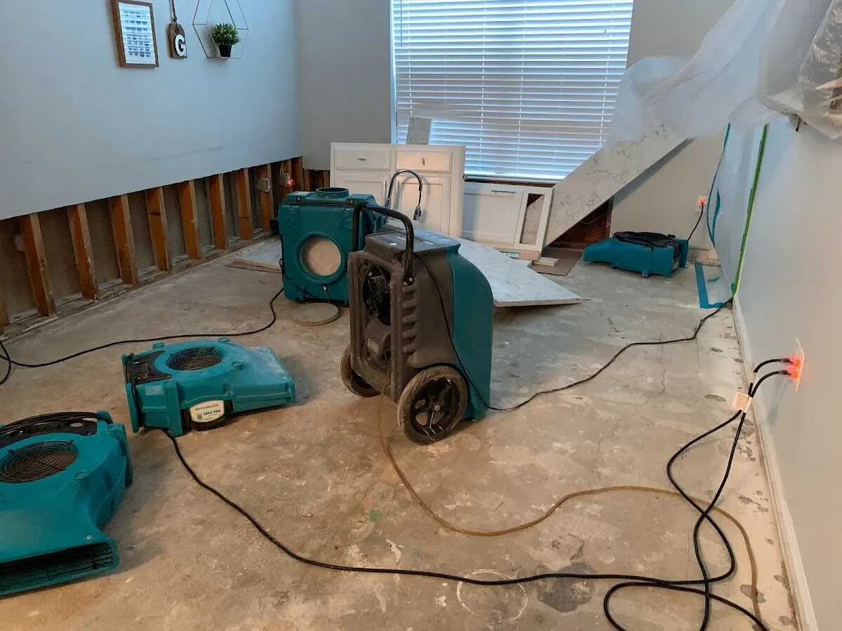 Dehumidifier in flood-cut room for Water Damage Restoration in North Chicago